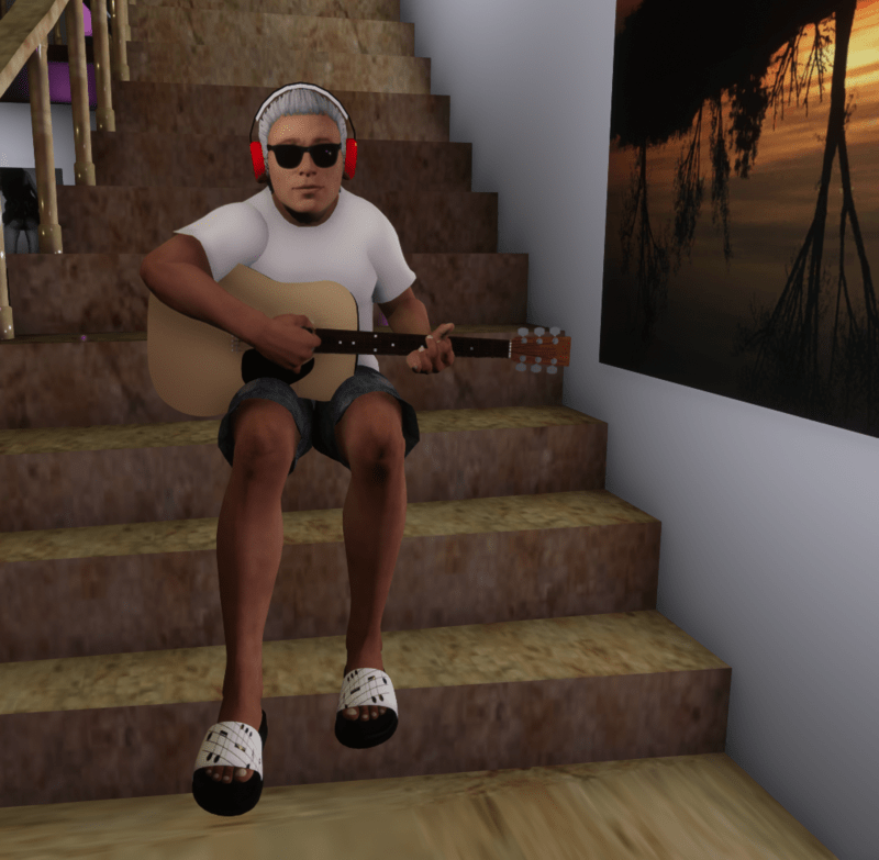 Male Guitar Sitting