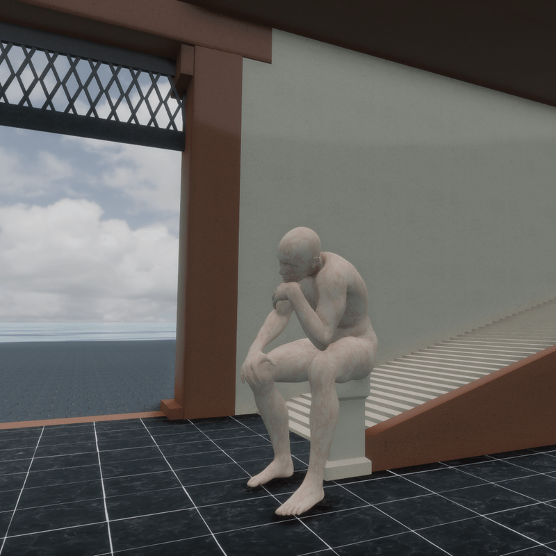 STATUES, SITTING MAN