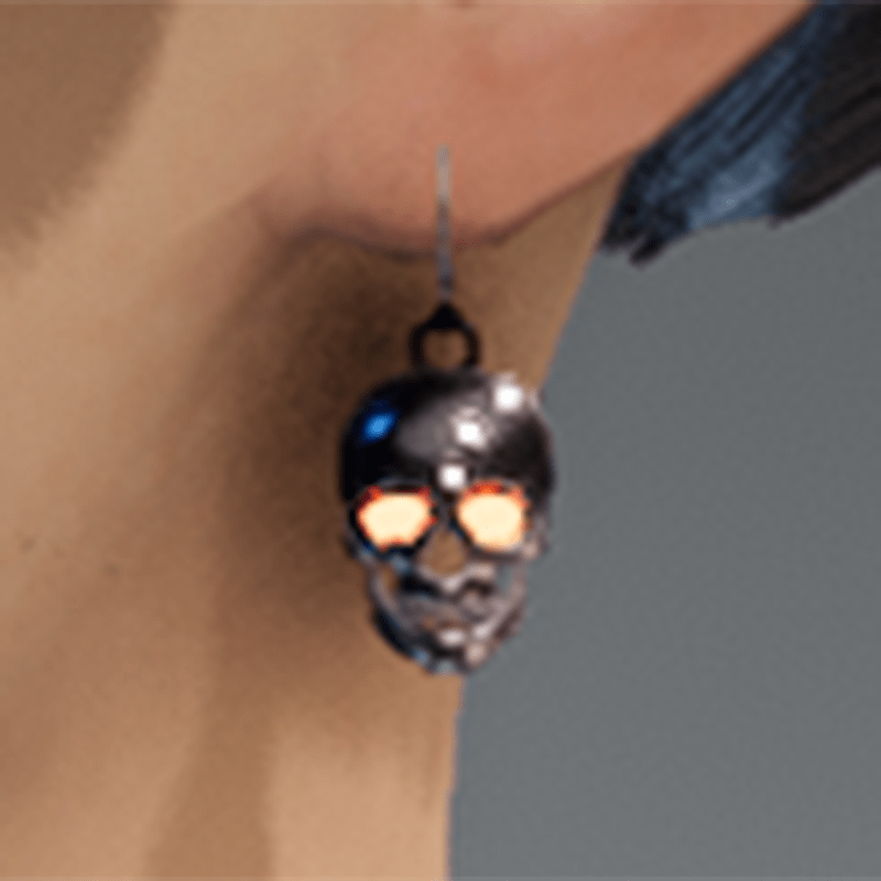 Emissive eyes skull earrings