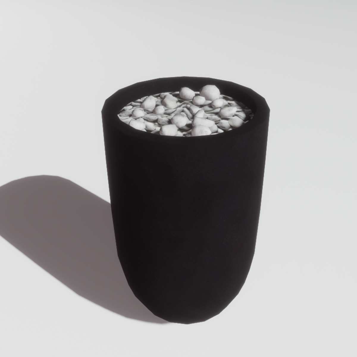 Stone pot with pebbles