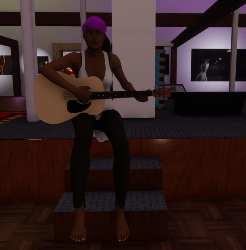 Female Guitar Sitting Down